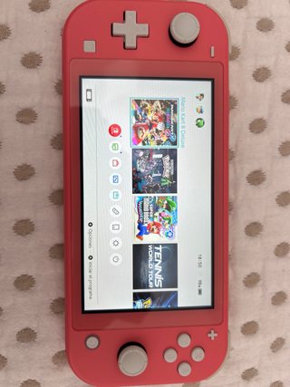 Nintendo Switch Lite+ Fifa 21 + MaKartDeluxe+ Carg