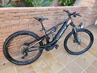 Bici Montaña Eléctrica Whistle doble suspensión