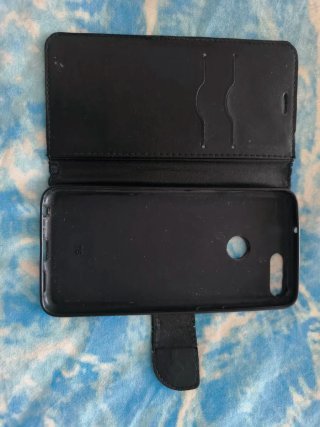 Custodia telefono nera a portafoglio similpelle