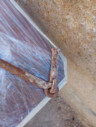 Ferma porta in ferro battuto