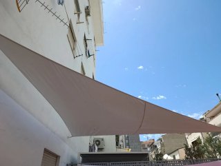 Toldo Vela Triangular crema