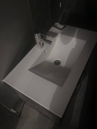 Lavabo de cerámica con mueble