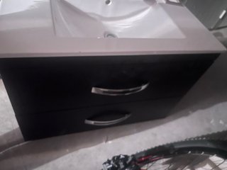 Lavabo de cerámica con mueble