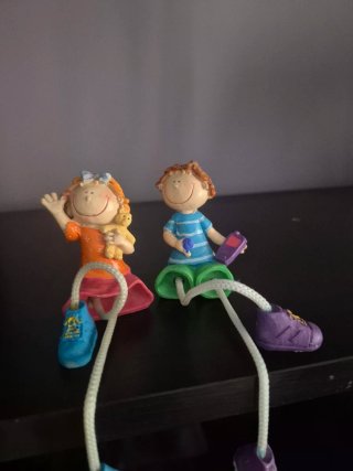 Figuras infantiles cerámica niño y niña
