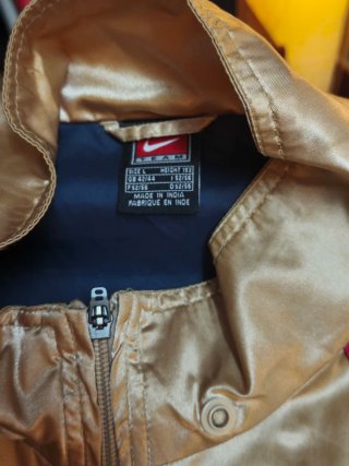 Chaqueta FC Barcelona Nike Dorada
