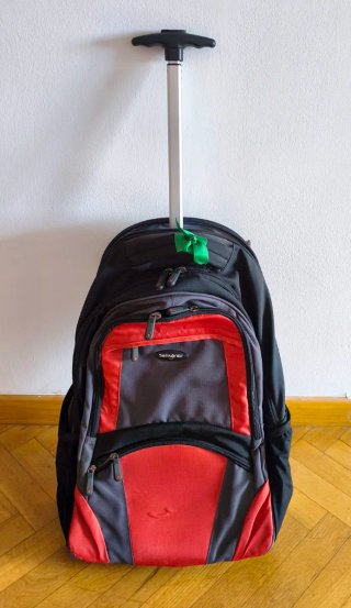 Mochila Samsonite gris y coral