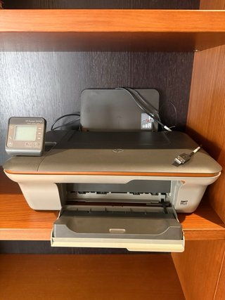 Impresora HP Negra y Naranja