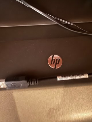 Impresora HP Negra y Naranja
