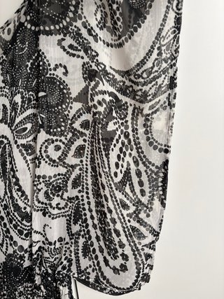 Blusa vaporosa transparente con cintura elástica
