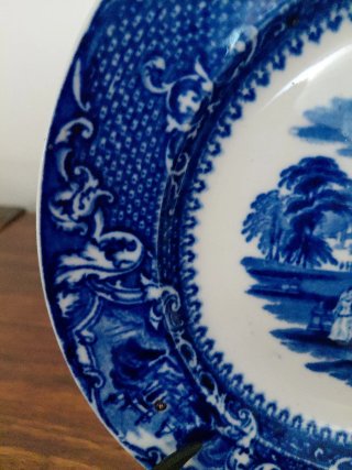Plato azul antiguo decorado