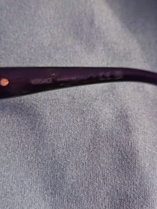 Gafas de sol Versace negras y doradas