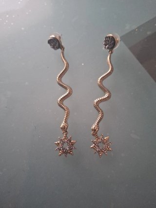 Pendientes serpiente con estrella