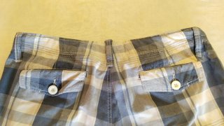 2 Bermudas de hombre blanco y a cuadros