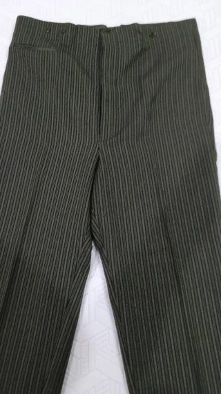 Traje de corto verde y rojo