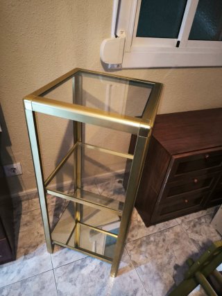 Mesa auxiliar cristal y metal dorado