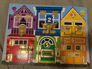 Tablero de Pestillos Melissa & Doug