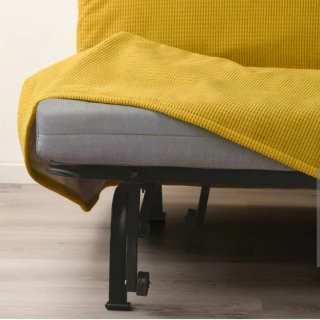 Sofá cama amarillo tela