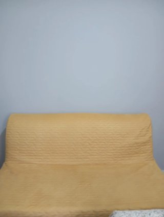 Sofá cama amarillo tela