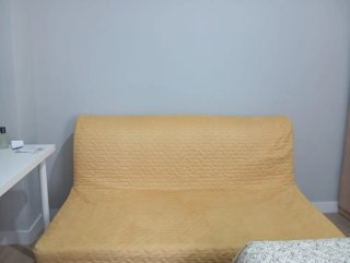 Sofá cama amarillo tela