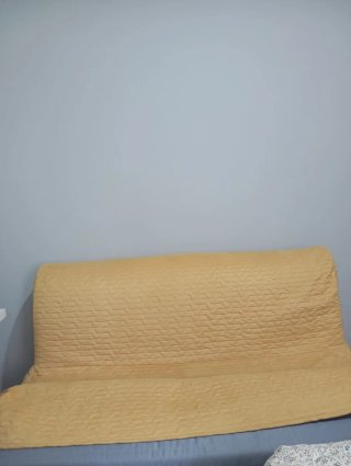 Sofá cama amarillo tela