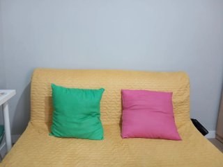 Sofá cama amarillo tela