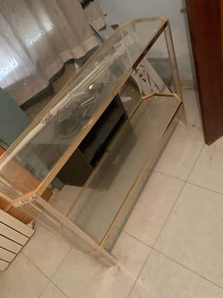 Mesa de entrada cristal y metal dorado