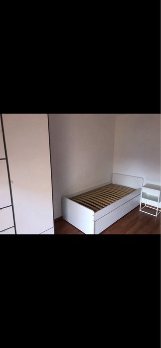 Cama nido blanca con cajones, mesita y armario