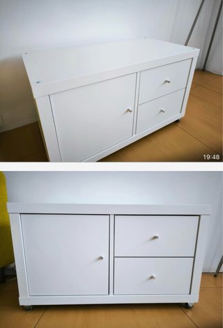 Mueble blanco con puertas y cajones