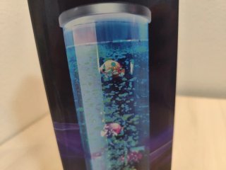 Lámpara de burbujas con peces flotantes