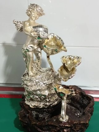 Fuente Ángel en plata