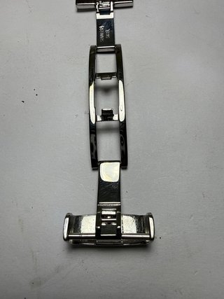 Broche Tissot Acero