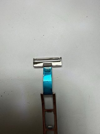 Broche Tissot Acero