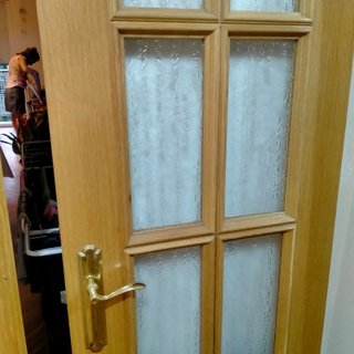 Puerta doble de roble con cristal