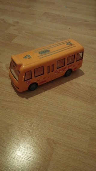 Autobús escolar de juguete musical