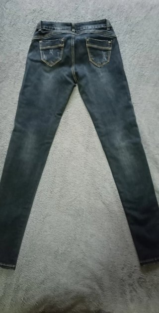 Conjunto Top rosa y Jeans Rotos negros