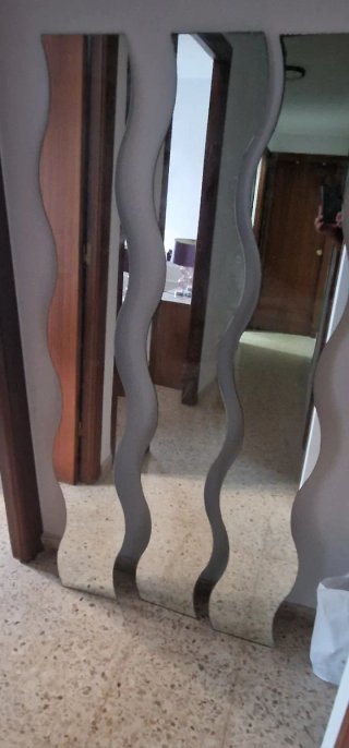 Espejo decorativo ondulado plata