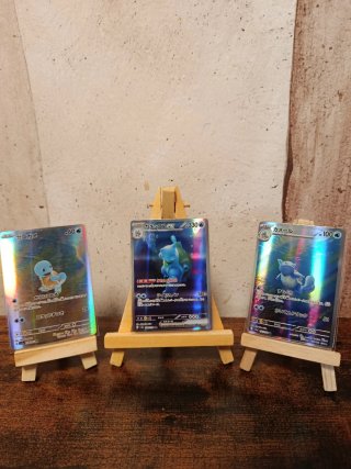 Trío de cartas Pokémon: Squirtle, Wartortle, Blast