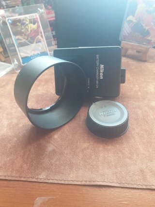 Nikon: Cargador MH-24, Parasol, Tapa trasera F