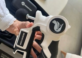 Pistola de masaje