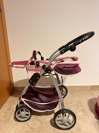 Cochecito de juguete rosa y morado