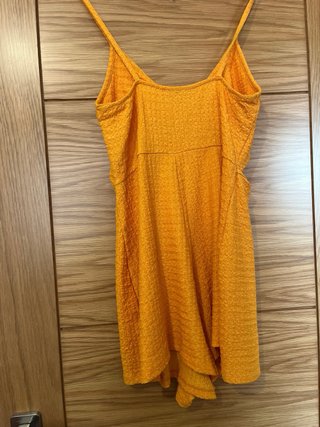 Mono corto amarillo mostaza con tirantes