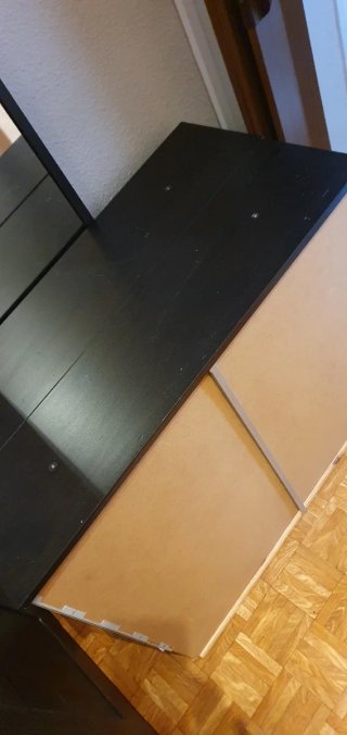 Diván negro Ikea con cajones