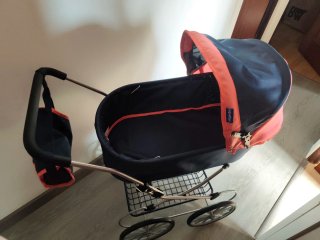 Carrito de muñecas azul y rosa