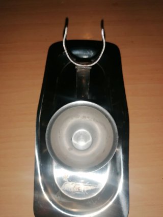 Calienta copas de metal