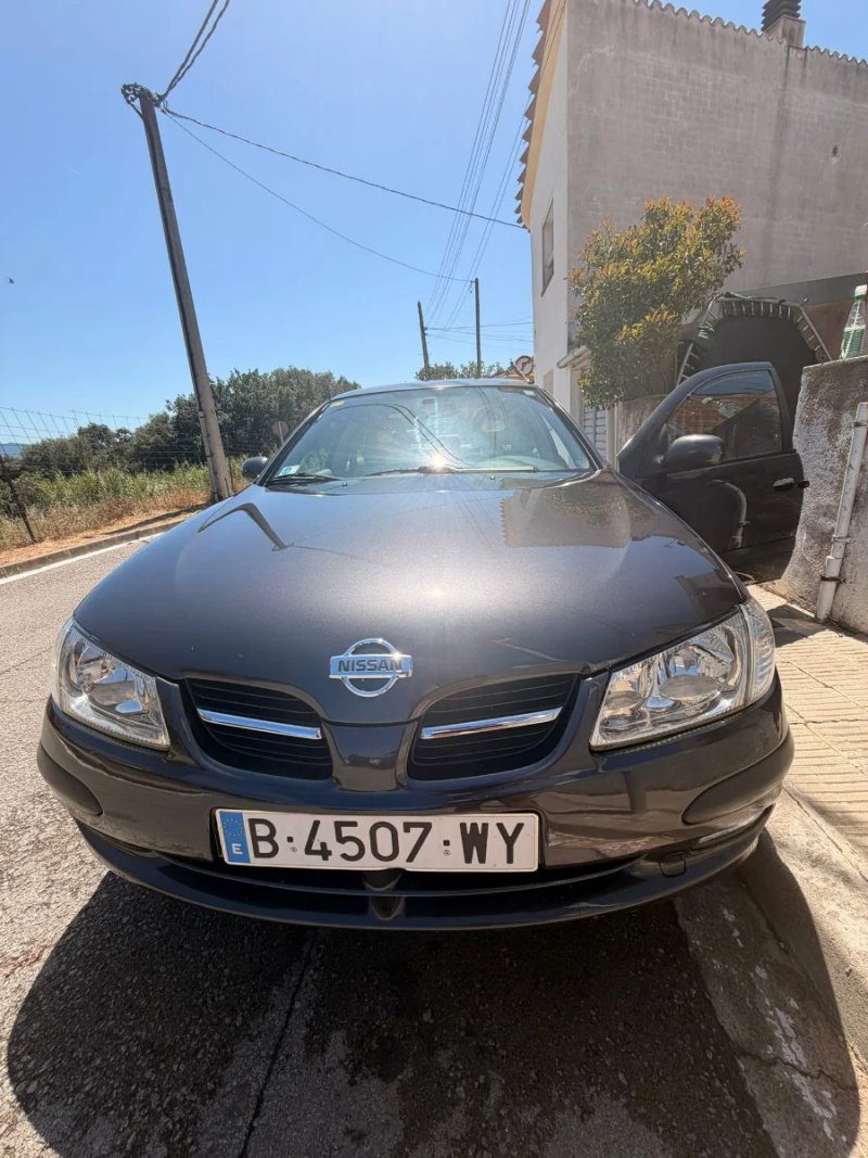 Nissan Almera 2000 - foto 1