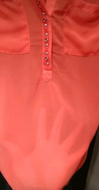 Blusa coral sin mangas talla M