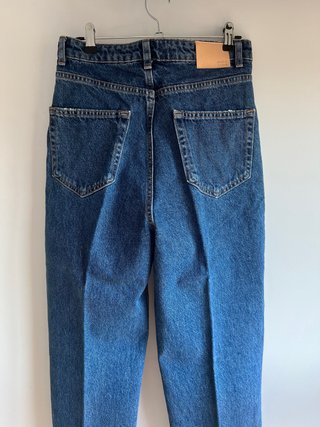 Vaqueros con cierre asimétrico de Mango, talla S-M