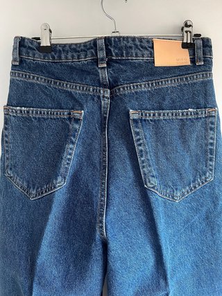 Vaqueros con cierre asimétrico de Mango, talla S-M