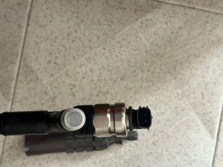 Inyector de combustible