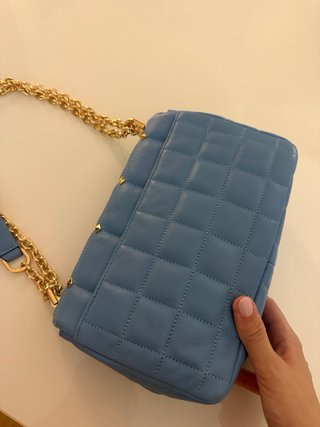 Bolso Michael Kors azul con tachuelas doradas